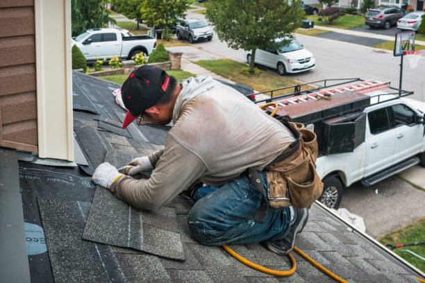Professional Roof Replacement technician working in Dunkirk, NY